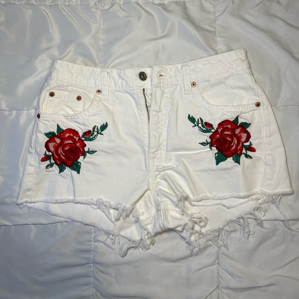 White H & M shorts, with roses on the pockets